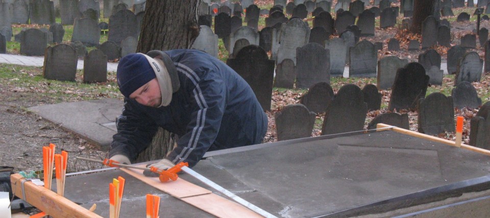 0.3  Granary Burying Ground, 18th Century Slate Crypt, Boston MA. Mending gragments on the brocken slate.