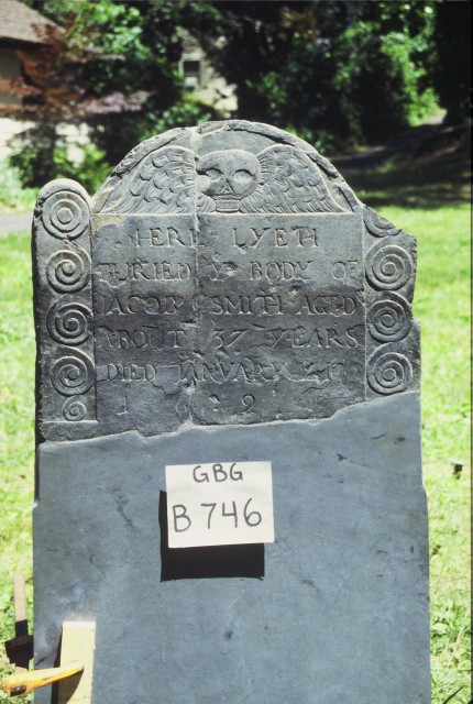 1.2 Jacob Smith, 1699, Granary Buring Ground, Boston, MA.  View of the repaired slate with a replcement slate base.