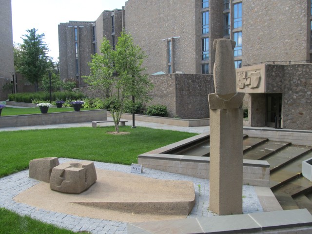 1.2.1 Constantino Nivola, 1962, Stiles College, Yale University.  Overview of sculptures in Eero Saarinen interior courtyard
