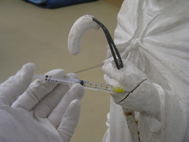 2.3.9  Plaster Model, Christian Petersen, Christian Petersen Museum, Iowa State University, Ames. Injecting break-line of plaster sculpture.