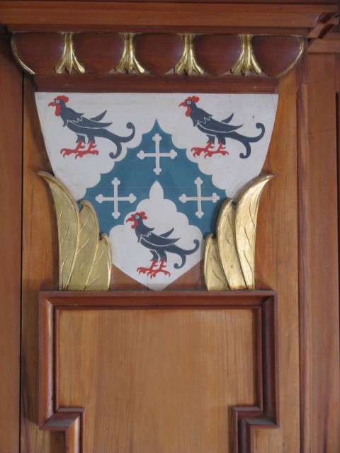 3.6.7 Crest, St. Thomas More Chapel, Yale University.  Painted and gilt wood after treatment.