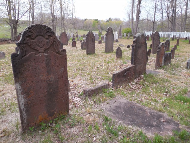 9.15.3 Old North Burying Ground, 1735,  Middlefield, CT. Overview in spring. Numerous markers are broken at grade with markers on ground.